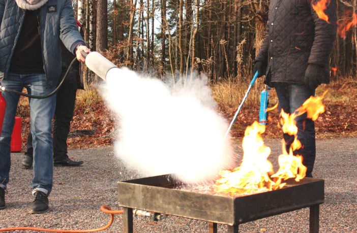 Using a fire extinguisher as a weapon